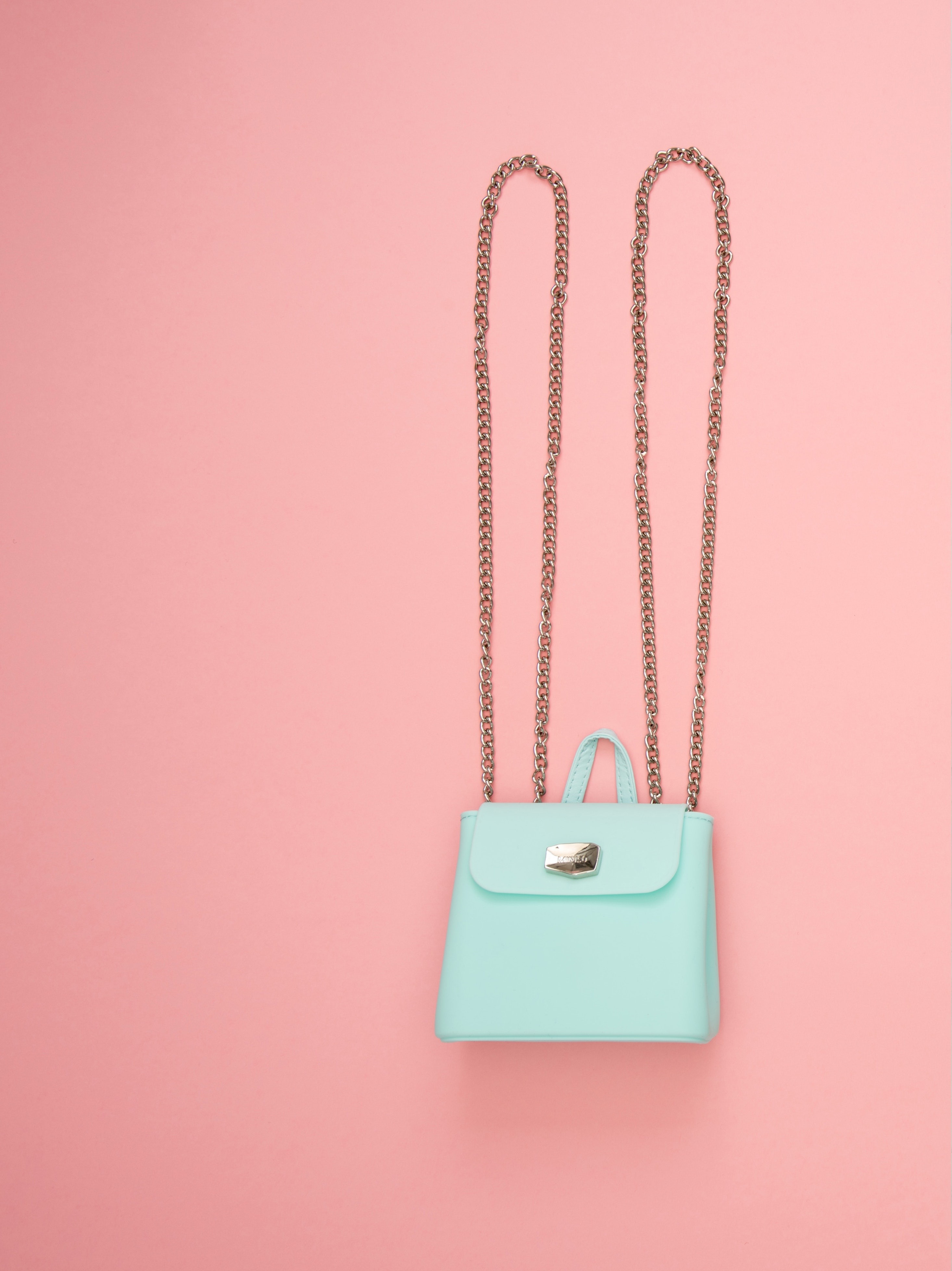 photo-of-two-teal-and-pink-leather-crossbody-bags-1038000_-_part_1.jpg